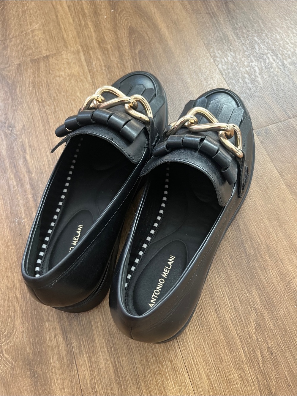 ANTONIO MELANI Black Leather Fringe Loafers with Gold Chain Accent - Picture 2 of 5